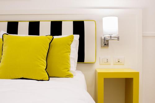 Katil atau katil-katil dalam bilik di NAP Luxury Guest House Bovio