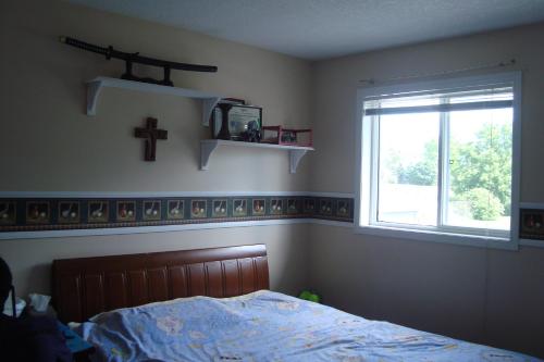Una cama o camas en una habitación de HB Guest Home 3