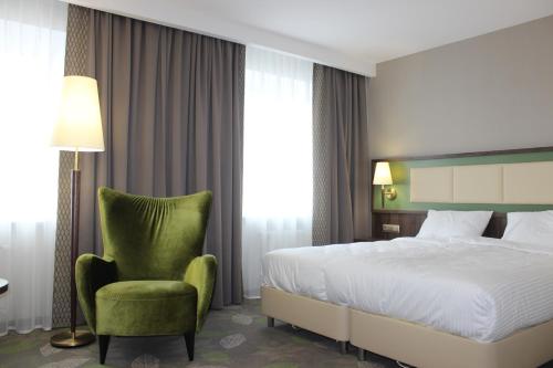 Postel nebo postele na pokoji v ubytování Hotel Devon