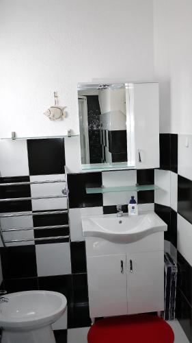 Phòng tắm tại Apartmani Nata