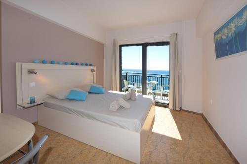 Ένα ή περισσότερα κρεβάτια σε δωμάτιο στο Horizon View Studio