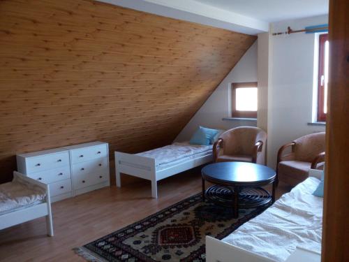 Ένα ή περισσότερα κρεβάτια σε δωμάτιο στο Nad stawem