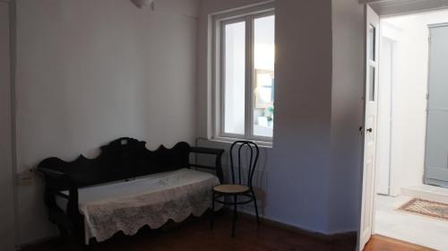 Ένα ή περισσότερα κρεβάτια σε δωμάτιο στο Marcos Rooms