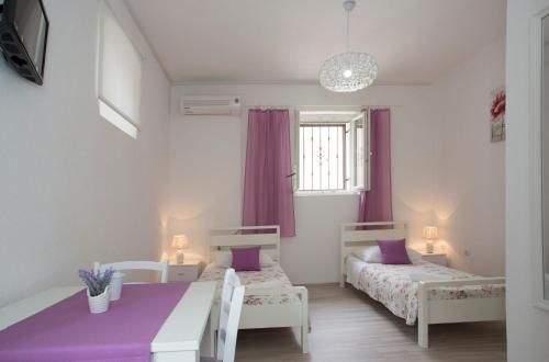 Posteľ alebo postele v izbe v ubytovaní Summer Bay Apartments