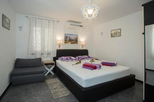 Łóżko lub łóżka w pokoju w obiekcie Guesthouse Aleto