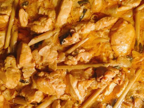 a pile of food with chop sticks in it at Hostal ROM Familiar in Roses