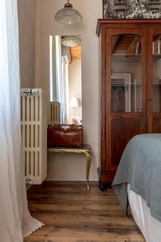 Una cama o camas en una habitación de CasaBiondani Lazise