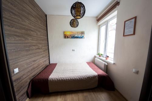 Ліжко або ліжка в номері Apartment 39Gvardeyskoy