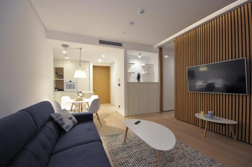 TV a/nebo společenská místnost v ubytování Leona Residences Apartment
