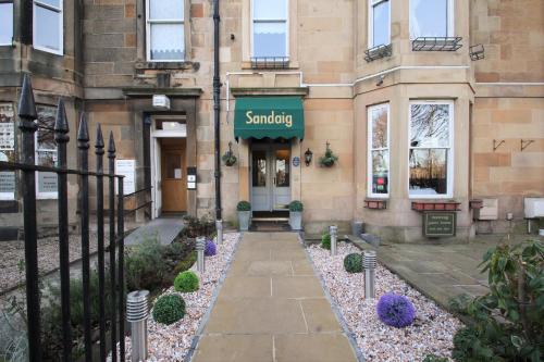 a building with a sign on the front of it at The Sandaig in Edinburgh