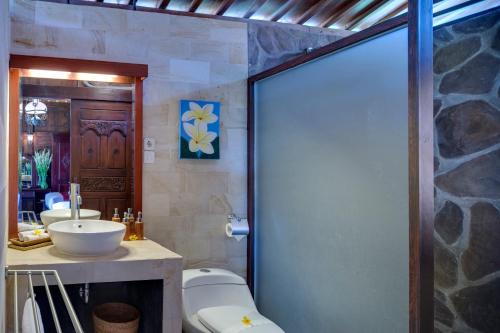 Koupelna v ubytování Diamond Beach Villa Lombok