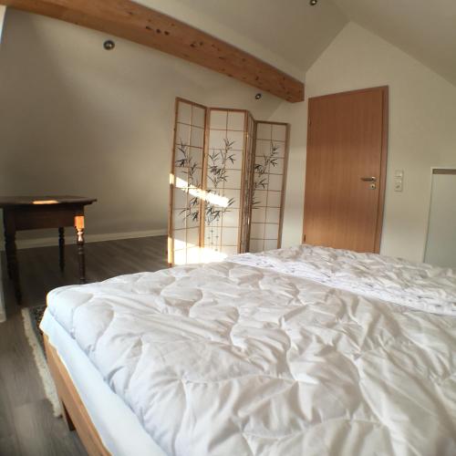 Postel nebo postele na pokoji v ubytování Gäste-Appartement-Kirsammer