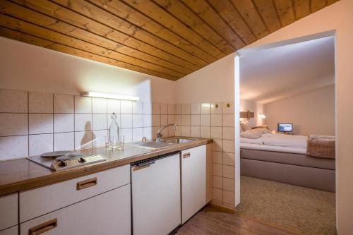 Kuchyň nebo kuchyňský kout v ubytování Haus Central