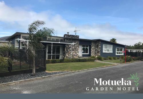 a house on the side of a road at Motueka Garden Motel in Motueka