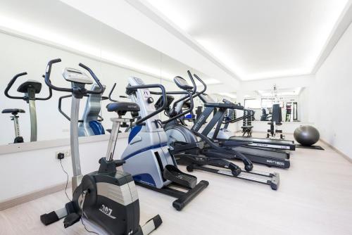 a row of exercise bikes in a gym at Hotel Cala Fornells in Paguera