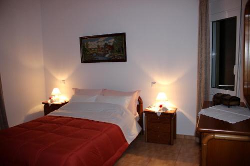 Giường trong phòng chung tại Villa Sofia Filoxenia