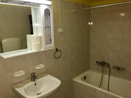 Koupelna v ubytování Argo Apartments