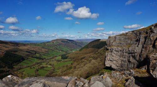 a view from the top of a mountain at Wales' Highest Village - The Chartist Cottage - Trefil in Tredegar