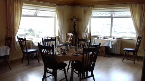 Restaurant ou autre lieu de restauration dans l'établissement Achill West Coast House