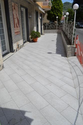 a sidewalk in front of a building at Hotel Il Gatto in Rapallo