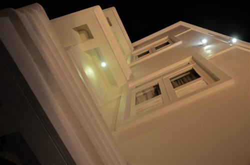 a white building with lights on top of it at TheBlanc Boutique Hotel in Melaka