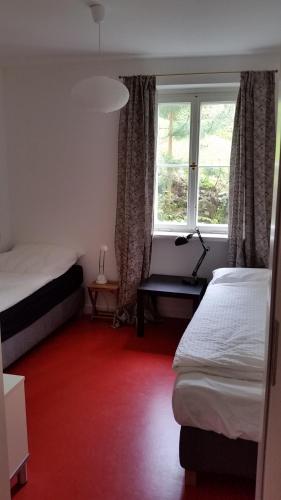 מיטה או מיטות בחדר ב-Villa im Park Wachwitzgrund