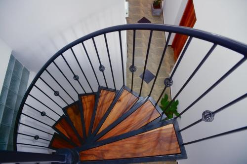 a close up of a spiral stair case at Amsterdam Tourist Rest in Anuradhapura