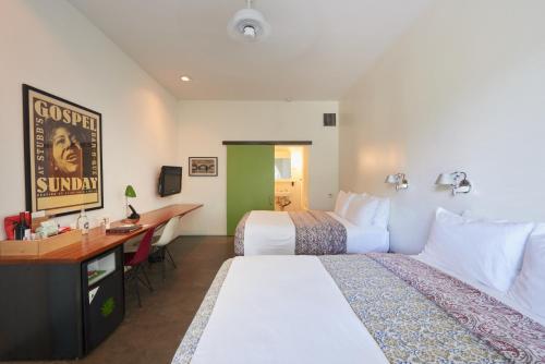Postel nebo postele na pokoji v ubytování Hotel San Jose