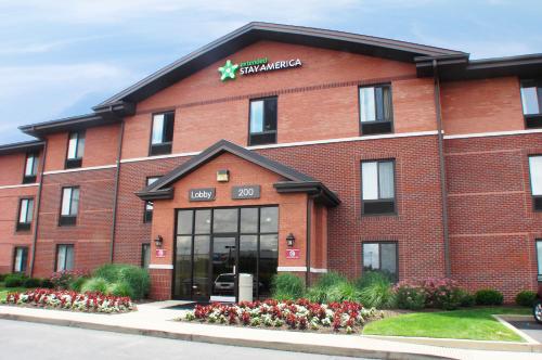 a red brick building with a star sign on it at Extended Stay America Suites - Pittsburgh - Airport in Imperial