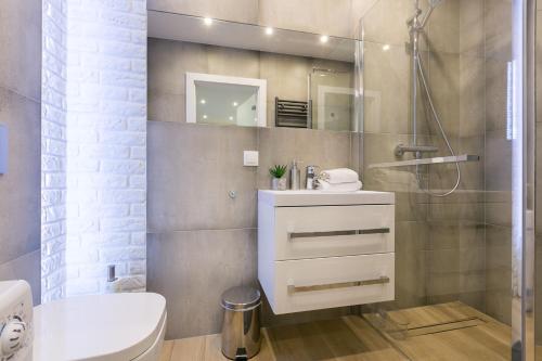 Koupelna v ubytování VIP Apartamenty Centrum