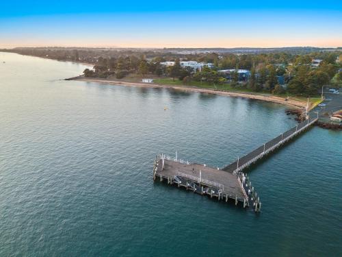 an aerial view of a dock in a body of water at North Pier Hotel in Cowes