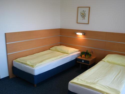 Postel nebo postele na pokoji v ubytování Gästehaus der LK-Technik Mold
