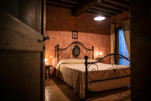 En eller flere senge i et værelse på La Tenuta Dei Ricordi