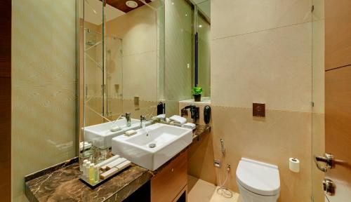 Phòng tắm tại Niranta Transit Hotel Mumbai Airport - At Arrivals