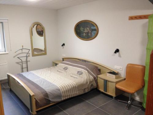 B&B Aalsters genot tesisinde bir odada yatak veya yataklar