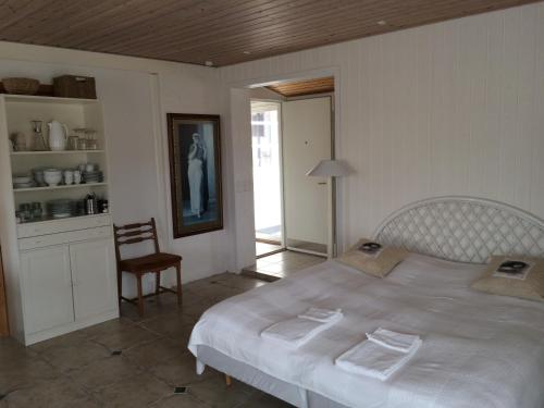 Postel nebo postele na pokoji v ubytování Knasborg Ferieboliger