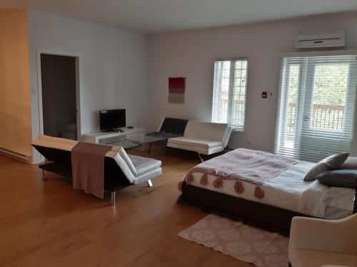 Postel nebo postele na pokoji v ubytování Condos Vacances Orford