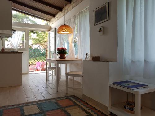 a kitchen with a table and a dining room at Villa Vittoria in Citta' Sant'Angelo