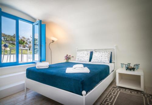 Ένα ή περισσότερα κρεβάτια σε δωμάτιο στο Fava Eco Suites