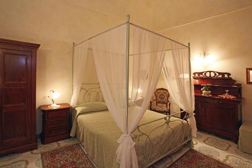 Un ou plusieurs lits dans un hébergement de l'établissement L'Antico Borgo Dei Limoni