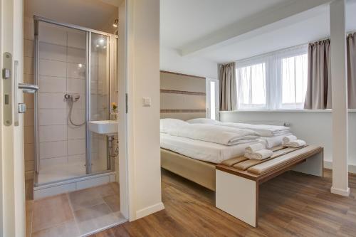 Ванна кімната в INA Boutique 030 Hannover-City
