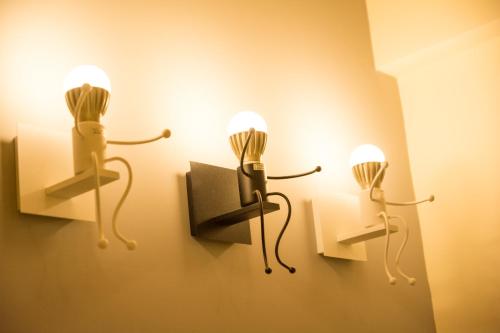 two wall mounted phones are on a wall at W Hostel in Tainan