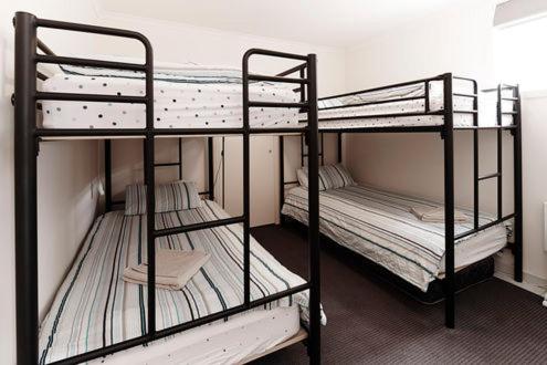 A bunk bed or bunk beds in a room at Reindeer 3
