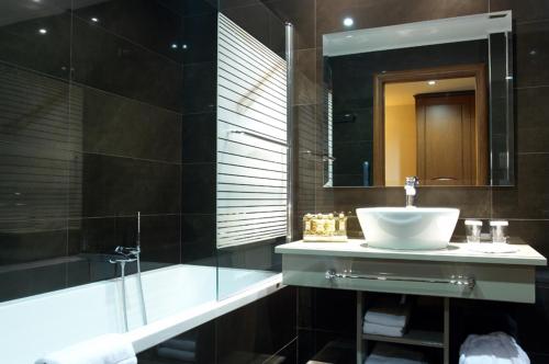 Ванная комната в Tagli Resort & Spa