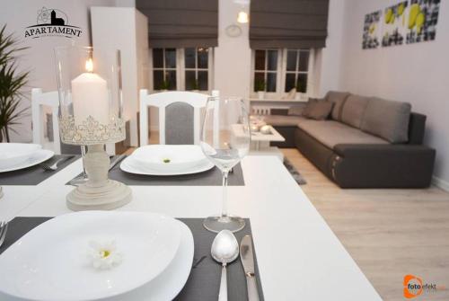 Posedenie v ubytovaní Apartament Pod Kopernikiem