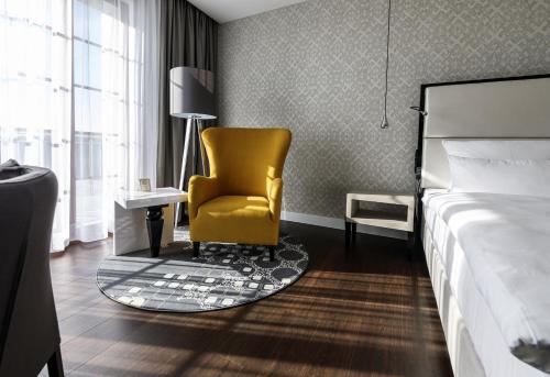 Un ou plusieurs lits dans un hébergement de l'établissement Hotel Wemperhardt