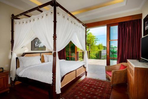 מיטה או מיטות בחדר ב-NicoNico Mansion