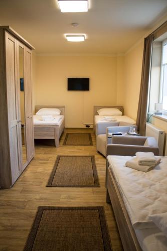Una cama o camas en una habitación de Haus Vier