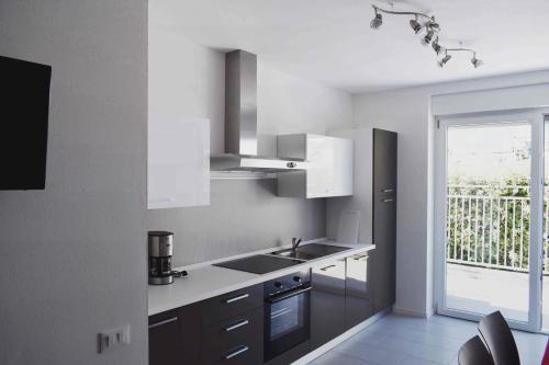 Η κουζίνα ή μικρή κουζίνα στο Residence Ambra
