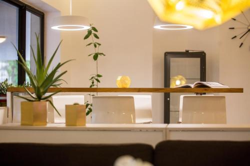 a counter with a mirror and a book on it at Nordic Villa in Abuja